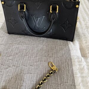 Louis Vuitton Black Satchel with Gold Hardware